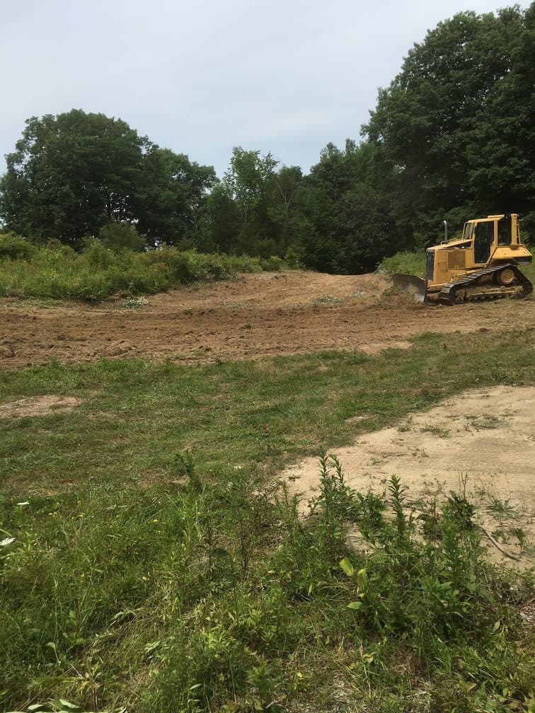 Bulldozer clearing land