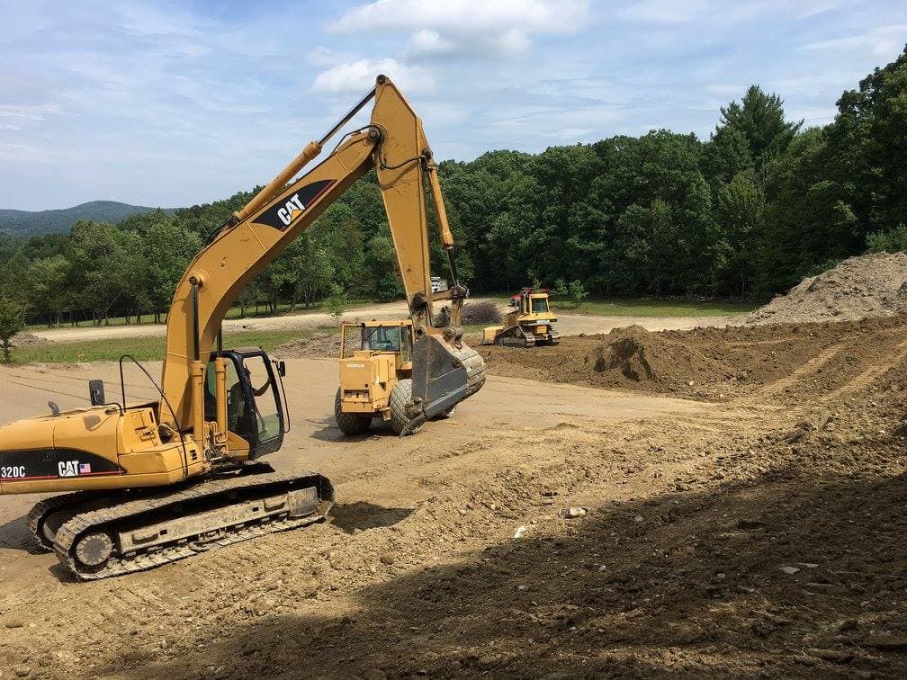 Excavator at work site
